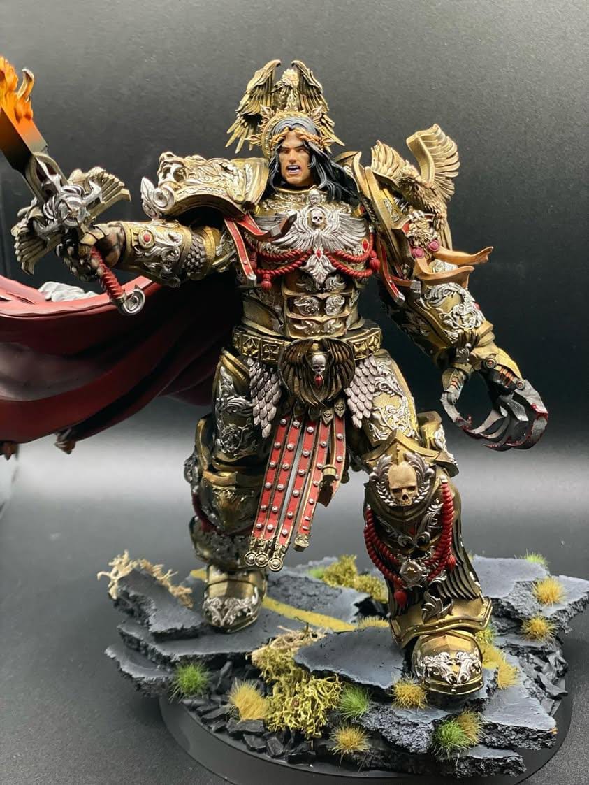 painted miniature holding a sword