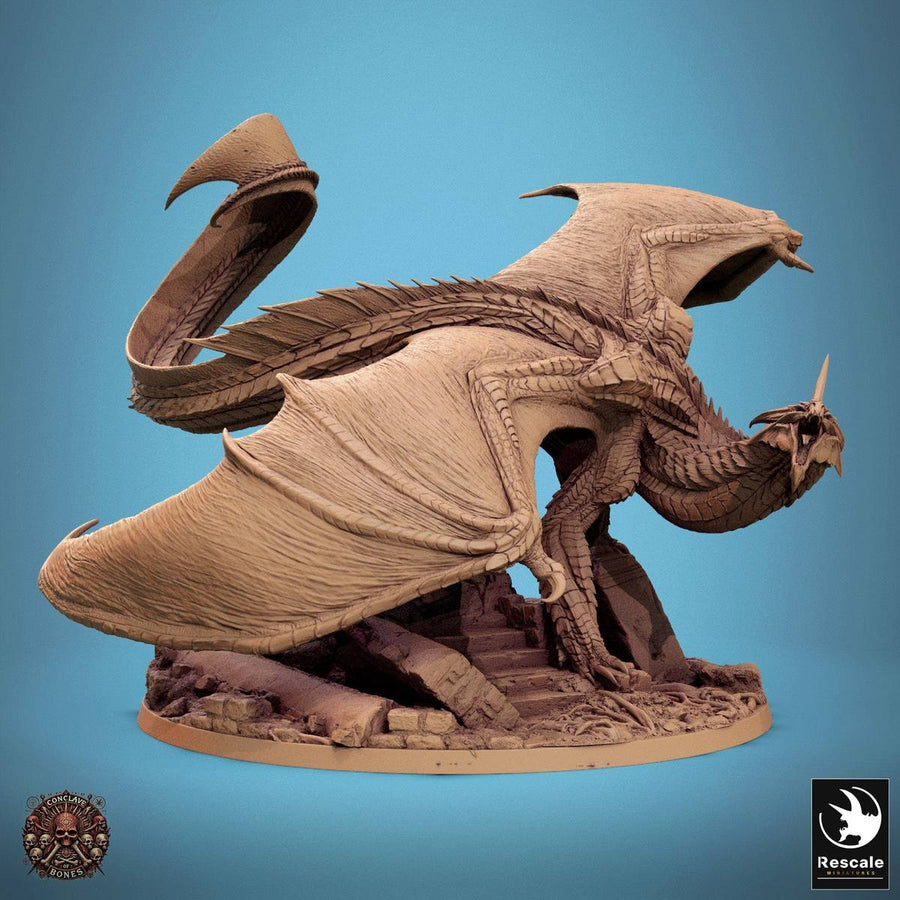 Dragon miniature in a dynamic pose, perched on a ruined stone staircase base.