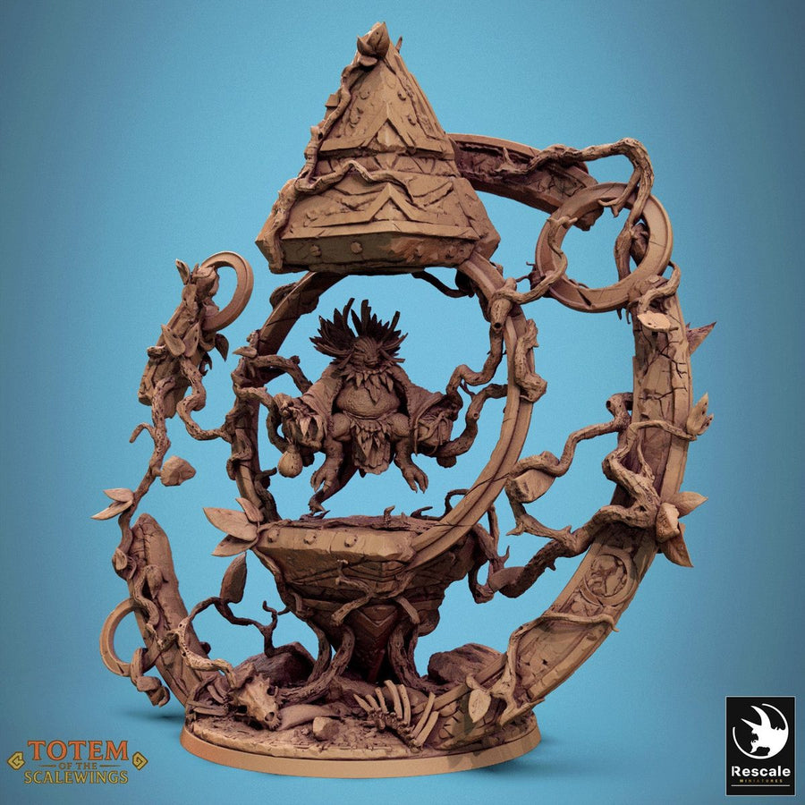 Front angle of the Ixakar creature suspended in a carved stone and vine totem frame.