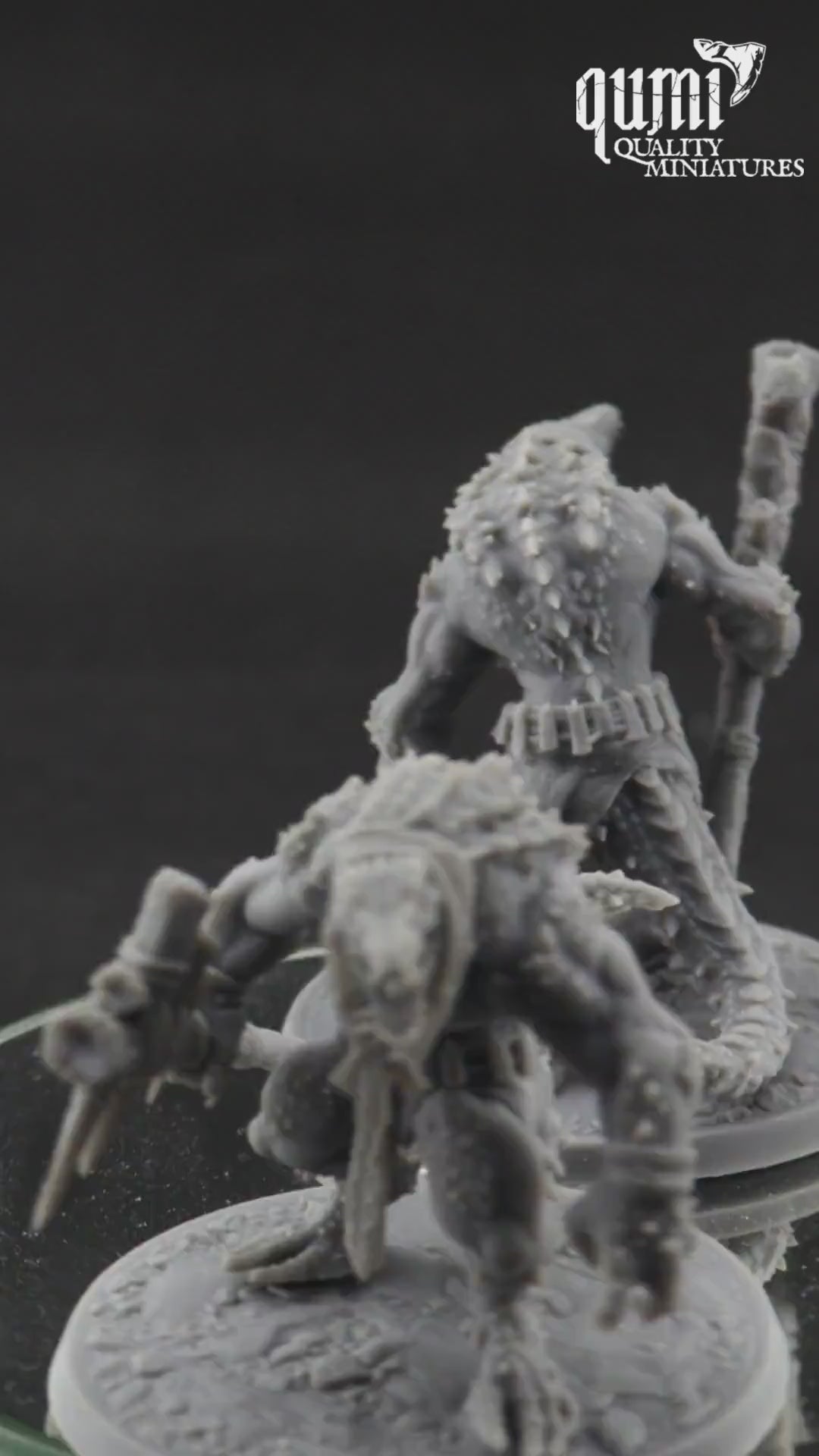 Lizardman Miniature on turntable with black background