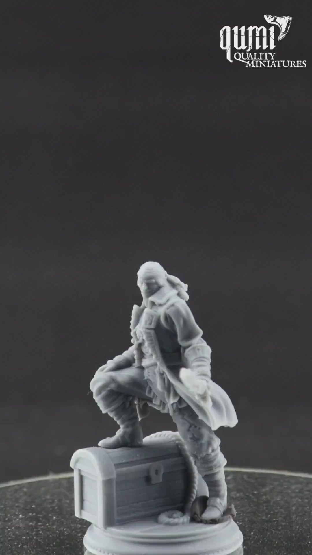 Human Miniature on turntable with black background