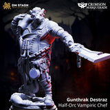 3D-printed resin miniature of Gunthrak the vampiric chef wearing a pig mask and apron