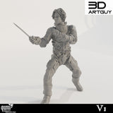 Dynamic front view of a male noble warrior miniature holding a combat knife