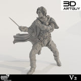Front view of a 3D-printed human male fighter miniature holding a small blade in a defensive stance.