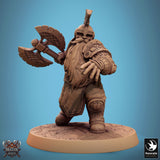 Dwarf warrior miniature holding a large axe in a defensive stance, front view on blue background.