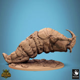 Detailed profile view of the Mirebound Crawler creature isolated on a blue background