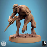 Savage ghoul leaping forward with a bone weapon, dynamic action pose on a rocky base.