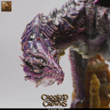 Close up focusing on the detailed reptilian head and sharp teeth of the dragon miniature