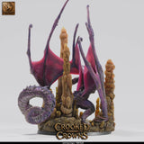 Side profile of the deep dragon model, showcasing the wingspan and cave terrain base from a low angle.
