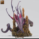 Rear view of the deep dragon miniature, highlighting the wings and detailed texture of the long, coiled tail.
