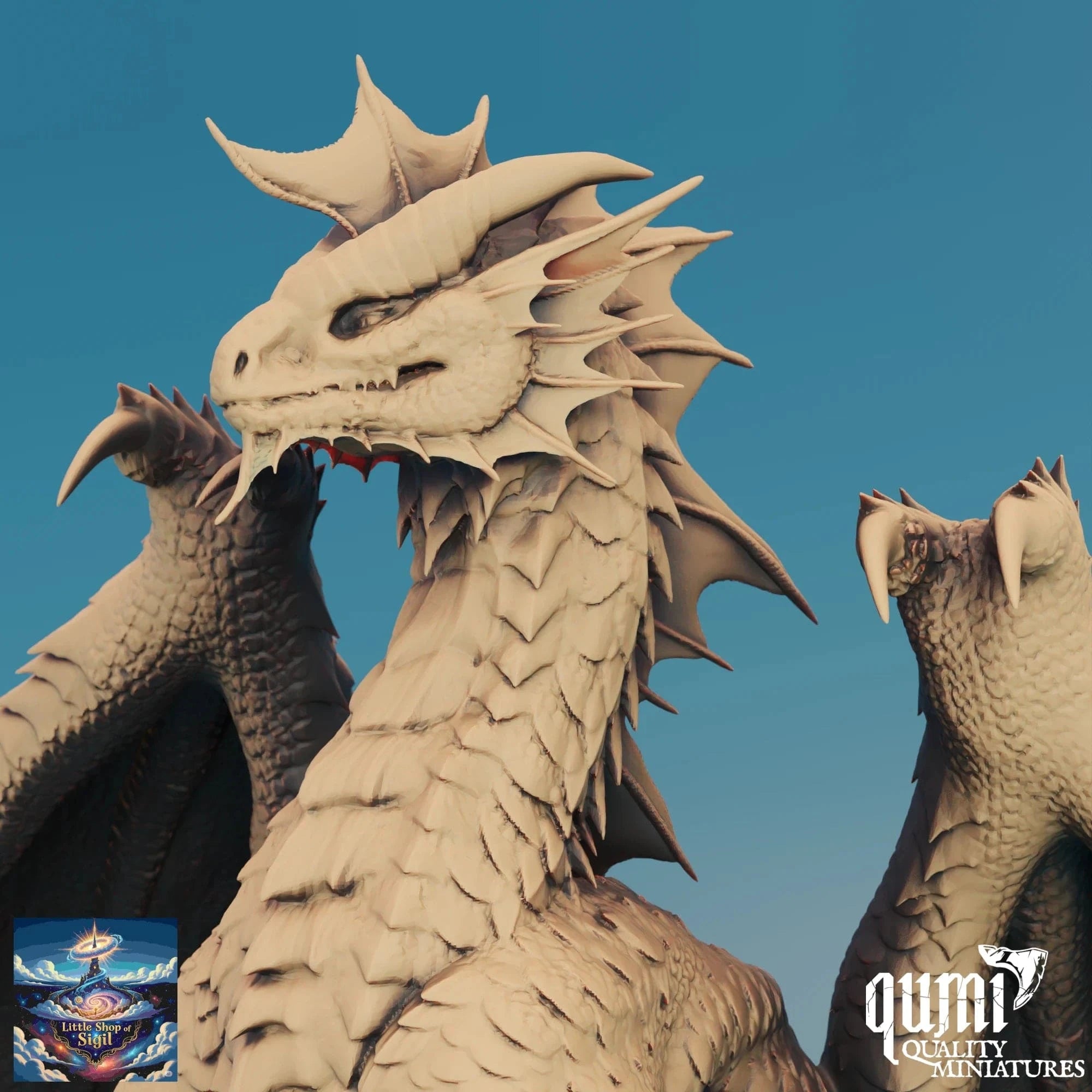 Dragon miniature sculpture with 'Qumi Quality Miniatures' branding on a blue background