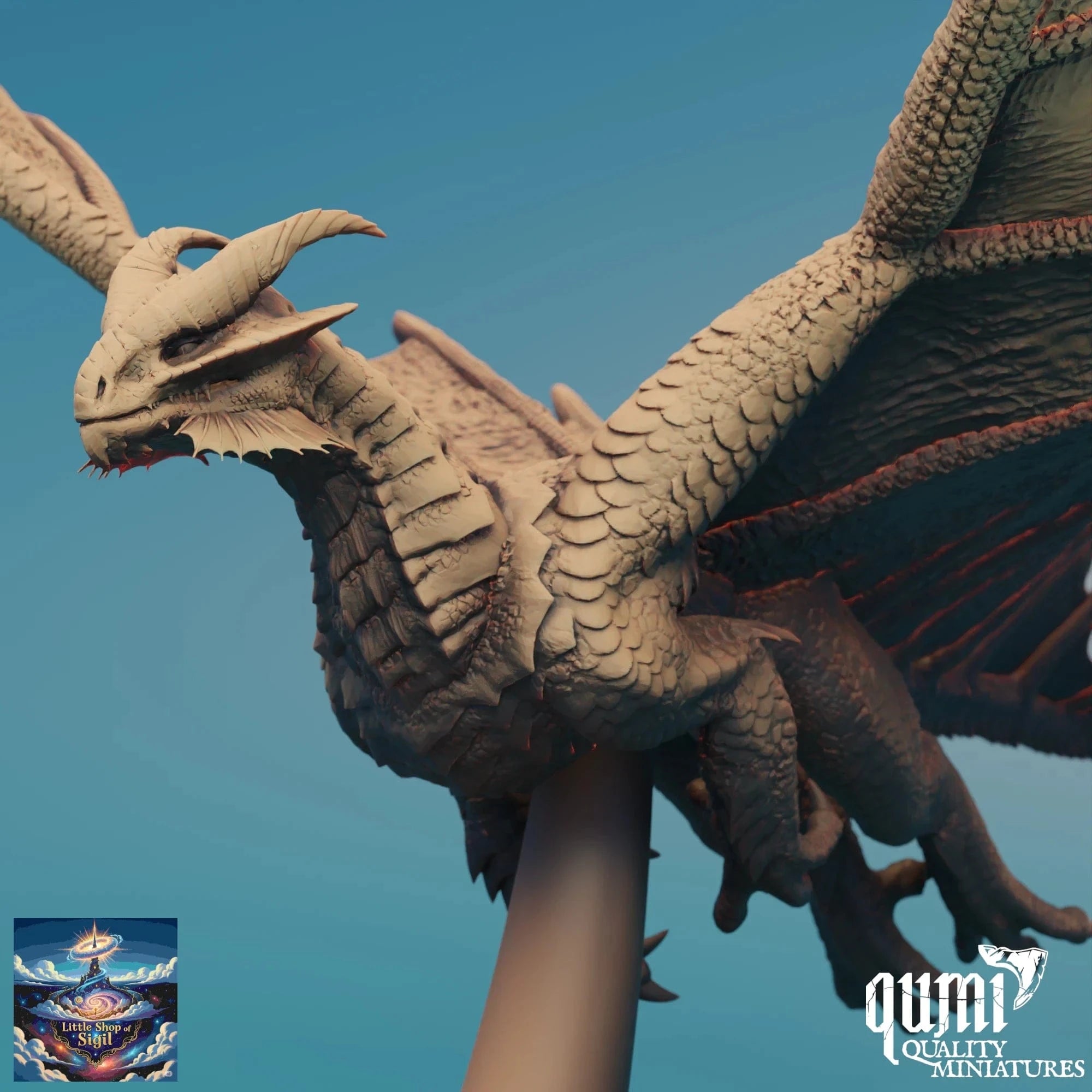 Dragon figurine with detailed scales and wings against a clear blue sky, featuring the Qumi Quality Miniatures logo.