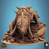 Front view of a large spiked monster beast standing on a rubble base with skeletal remains.