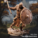 Human axe fighter miniature featuring detailed chainmail, wooden shield, and bearded helmet for tabletop gaming.