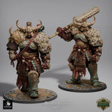 Two Oni Colossus monster miniatures standing side by side, one holding a club and the other walking, on a tabletop base.