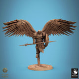 Side view of the winged warrior miniature holding a long spear with a shield on the left arm.