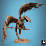 Front view of the winged warrior, shield facing forward with ornate details and a spear held horizontally.