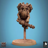 Flying dwarf gunslinger miniature holding a heavy rotary weapon