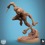 Ghoul miniature hunched over, reaching down with one hand, textured base.