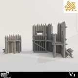 Two modular palisade wall segments showing the wooden stake details and internal bracing.