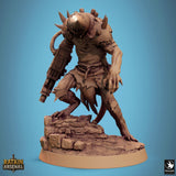 Crouching rat folk fighter miniature with a spiked helmet and mechanical weapon