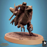 Side profile of a running raptor miniature on an oval base.