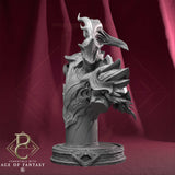 Gray 3D-printed Riteris Spiderbrood fantasy bust showing intricate armor detailing and flowing crest on a circular base.