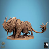 The Solarion warbeast miniature viewed from the side, showcasing intricate armor plating and beast features.