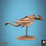 Side profile of the Zicoalt dinosaur miniature during flight.