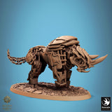 Low angle view of warrior with axe atop mechanical rhino.
