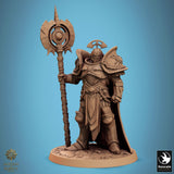 Warrior in ornate plate armor standing with a large circular mace held upright.
