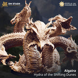 Front view of the Algaira Hydra miniature with multiple snarling heads and textured scales on a round base.