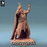 Angled side view of the human NPC miniature with arms raised in a casting pose, highlighting detailed fabric folds.