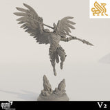Front 3/4 view of a winged angel warrior miniature holding a spear, standing on a rocky base.
