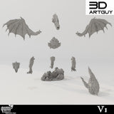Einzelteile des gepanzerten Drachen-Bausatzes inklusive Flügeln, Körper, Kopf und Basis