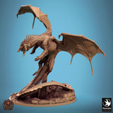 A side profile view of the black dragon resin miniature highlighting the intricate texture and skeletal design.