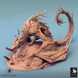Full body render of a bark-textured dragon perched on a rock base with a long, sweeping tail.