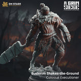 Front view of the 3D-printed colossal executioner miniature holding a massive hammer in a dark fantasy setting