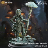 3D-printed resin miniature of a female Halfling Druid holding a mushroom staff, standing on a forest-themed base.