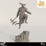 Side view of the demon miniature, showing the character in a dynamic pose, separated from the rocky base.