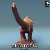 Front view of a 3D-printed Diplodocus dinosaur miniature with a long neck and textured skin.