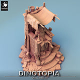 High angle view of the detailed stone terrain, decorative pottery, and seated lord character model.