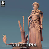 Detailed close up of female NPC figure in turban and robes with a feathered raptor companion