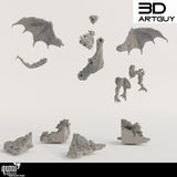 Einzelteile der Drachen-Miniatur aus Resin, inklusive Flügeln, Körper und detailliertem Sockel.