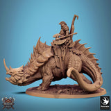 Profile view of a 32mm scale fantasy Drakanchor monster with an armored Axe Fighter rider