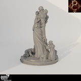 Rear view of a tall armored figure holding smaller figures with hooded acolytes kneeling on a round stone base.