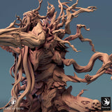 Close-up of the Dryad miniature focusing on the textured wooden face and skull carvings