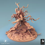 Angled front view of the Dryad fantasy miniature showing the intricate floral and skull details