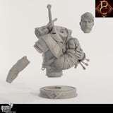 Unassembled resin bust kit with separate head, arm, torso, and display base parts on a white background.