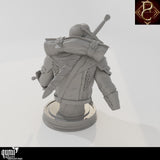 Back view of the resin fantasy bust displaying detailed armor, straps, and sword hilt